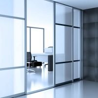 open glass door coupe in empty cubicle